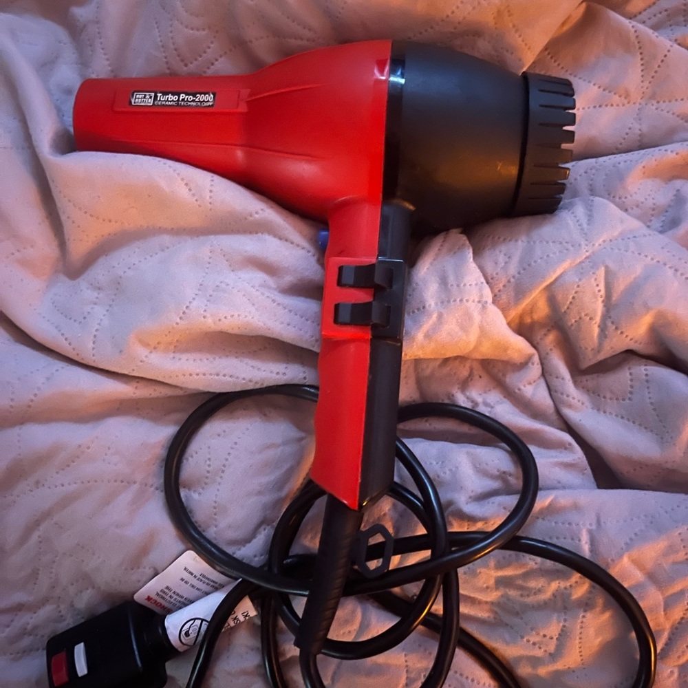 Good blow dryer still work like new not a broken piece on it. Gets really hot.